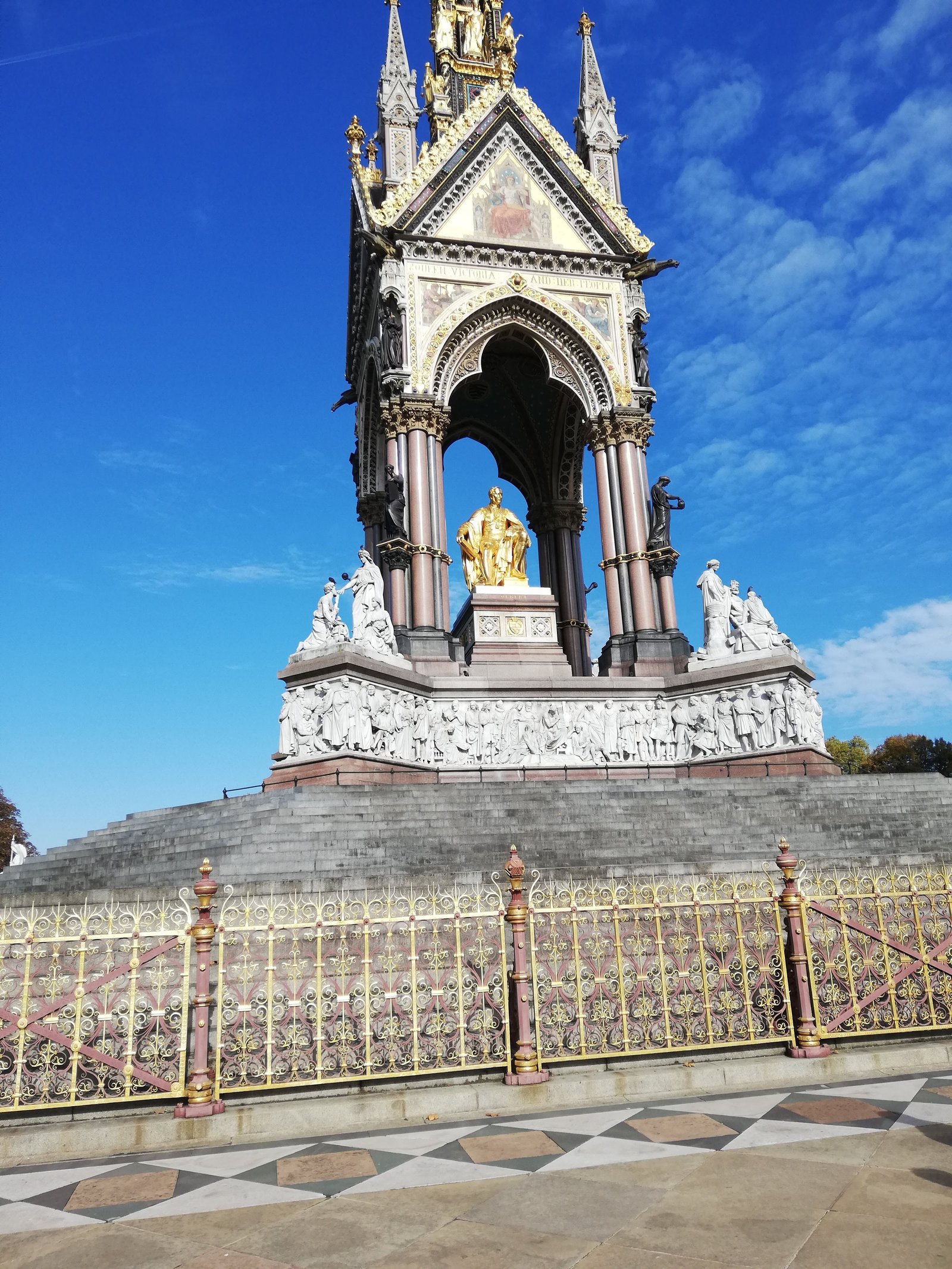 The Albert Memorial under blue sky.